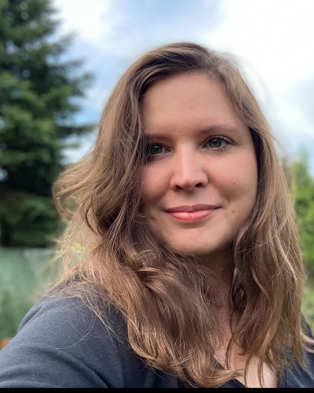 Portrait of Alicja Kordas outdoors in a garden